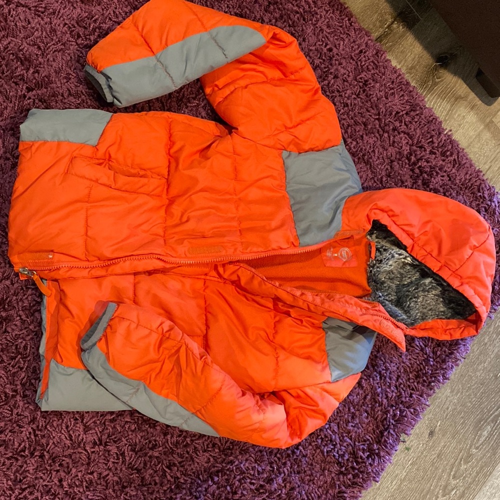 Orange and grey winter coat, sz M (8).  Only worn a few times. Fuzzy hood